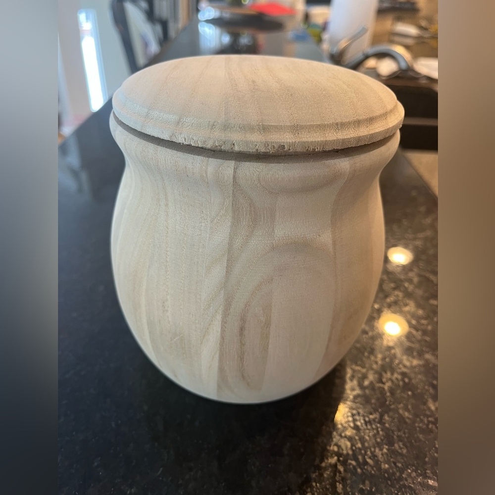 Round wooden container with lid